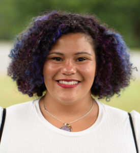 young woman smiling at camera