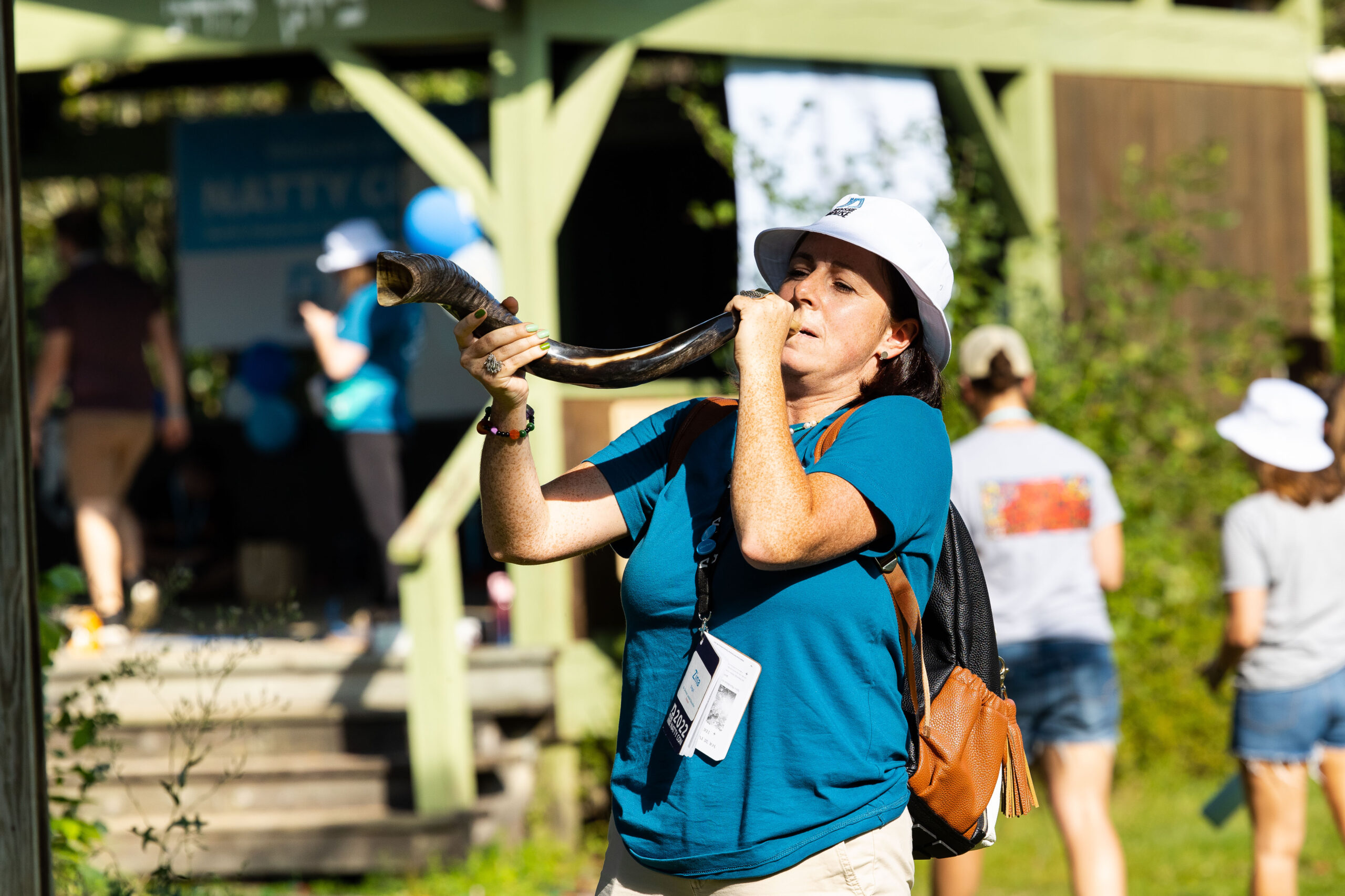 A woman blowing the shofar